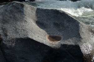 See the ghost face?  Like The Scream in rock.